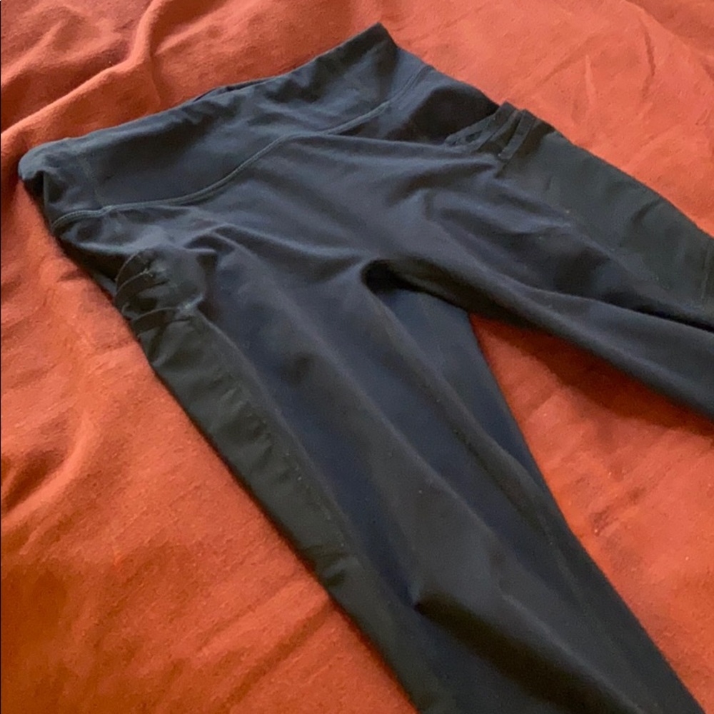 Fabletics black leggings mesh side triple pockets